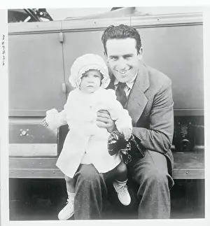 Actor Harold Lloyd Holding His Young Daughter
