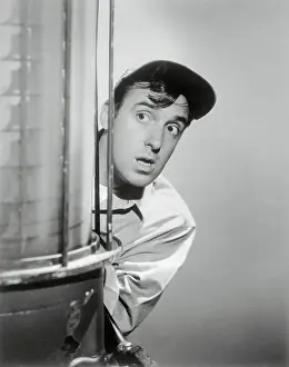 Actor Jim Nabors Peeping At Gas Station