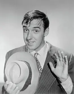 Actor Jim Nabors in Suit and Holding a Hat