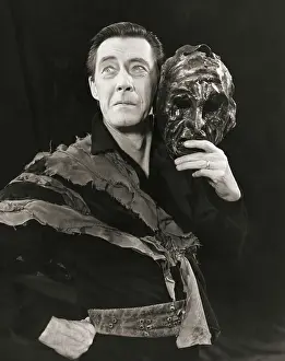 Actor John Carradine Holding Mask