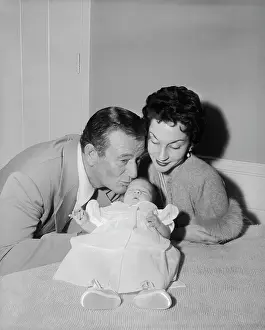 Actor John Wayne with His Wife and Newborn