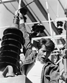 Actor Martin Sheen Hanging From Pole