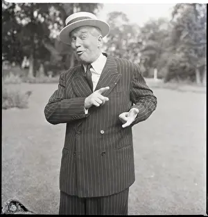 Actor Maurice Chevalier Wearing Boater Hat