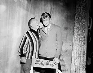 Actor Mickey Rooney Whispering to His Son on Acting Tips