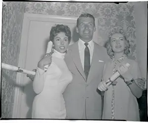 Actor Richard Egan Posing with Female Peers