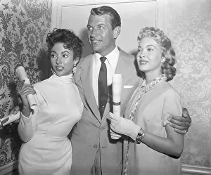 Actor Richard Egan Posing with Female Peers