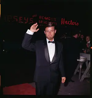 Actor Roddy McDowall Waving