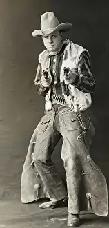 Revolver Prints: Actor Roy Stewart in Cowboy Attire Holding Revolvers