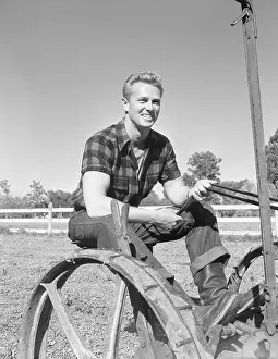 Ranch Prints: Actor Sterling Hayden Driving Farm Machinery