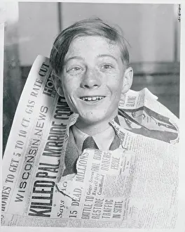 Actor Wesley Barry with His Head Through Newspaper