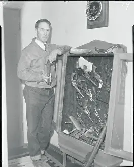 Former Actor William S. Hart at Home with His Gun Collection