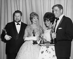 Actors and Actresses Holding Oscars