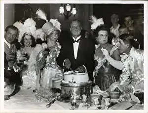 Cross Dresser Prints: Actors in Costume Cutting Cake