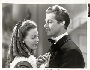 Touching Prints: Actors Don Ameche and Loretta Young