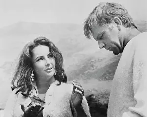 Actors Elizabeth Taylor and Richard Burton on the Beach