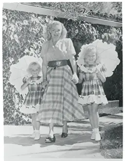 Actress Alice Faye with Her Daughters Holding Parasols