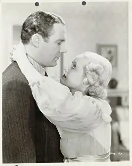 Intimacy Prints: Actress Bette Davis With Her Arms Around Neck of Actor Ian Hunter