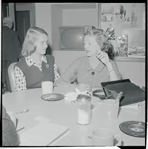 Hyman Prints: Actress Bette Davis and Daughter Sitting at Table Together