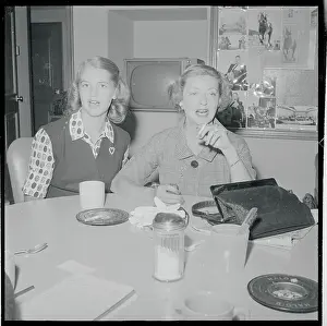 Hyman Prints: Actress Bette Davis and Daughter Sitting at Table Together
