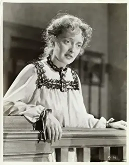Confrontation Prints: Actress Bette Davis With a Pondering Look on Staircase Balcony