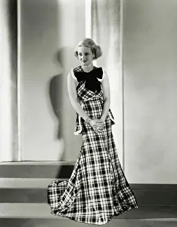 Peplum Prints: Actress Bette Davis Posing in Colorful Plaid Dress