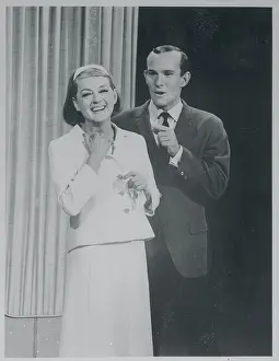 Actress Bette Davis Posing With Comedian Tom Smothers