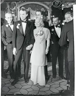 Actress Bette Davis Posing With Her Gentlemen Admirers