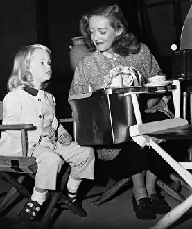 Hyman Prints: Actress Bette Davis With Her Young Daughter