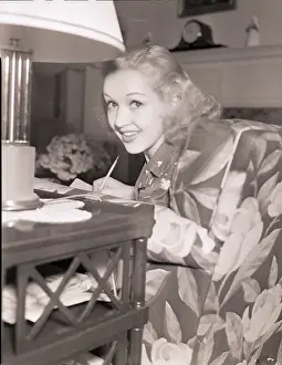 Actress Betty Grable Seated in Chair