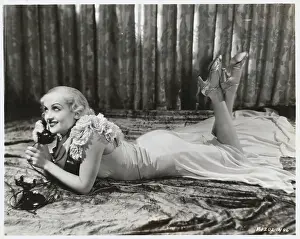 Comfortable Prints: Actress Carole Lombard on the Floor with Telephone