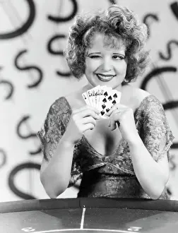 Card Playing Prints: Actress Clara Bow Holding a Royal Flush