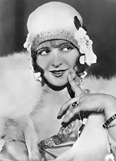 Playful Prints: Actress Clara Bow in Get Your Man
