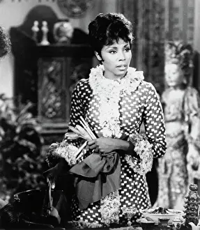 Actress Diahann Carroll Pausing on Set of Julia