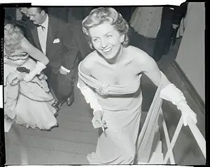 Actress Erica Beer Pausing on Staircase