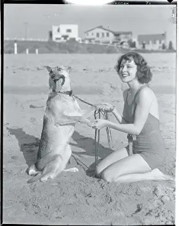 Actress Frances Dee on Beach with Dog
