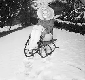 Sled Prints: Actress Gloria DeHaven on Snow Sled
