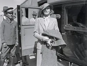 Actress Greta Garbo Pausing Outside Taxi