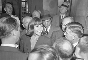Actress Greta Garbo Pausing for Slew of Reporters