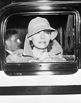 Actress Greta Garbo Peering from Automobile Window