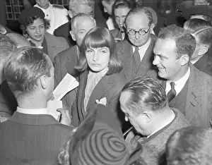 Actress Greta Garbo with Reporters