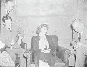 Actress Greta Garbo with Reporters