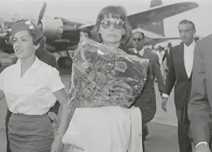 Actress Greta Garbo Strolling at Airport