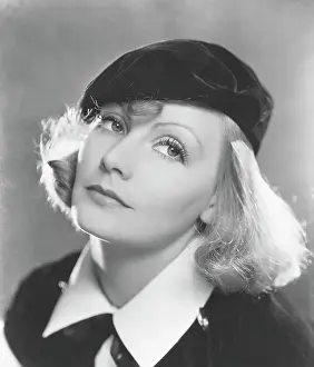 Prints of (Original Caption). USA: Greta Garbo, Metro-Goldwyn Mayer Timeless Elegance: The Iconic Greta Garbo Collection: Actress Greta Garbo Wearing Black Beret