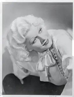 Comforting Prints: Actress Jean Harlow Smiling in Playful Pose