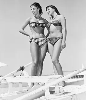 Actress Joan Collins and Sister Posing in Swimwear