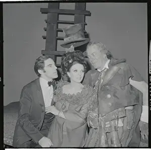 Actress Joan Collins Standing with Costars
