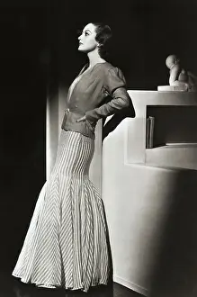Stylish Prints: Actress Joan Crawford Modeling Tailored Skirt and Jacket