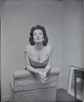 Actress Linda Cristal Posing on Chair