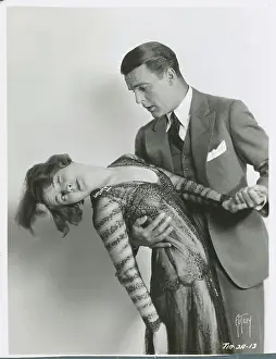 Actress Lois Moran in Arms of actor Neil Hamilton