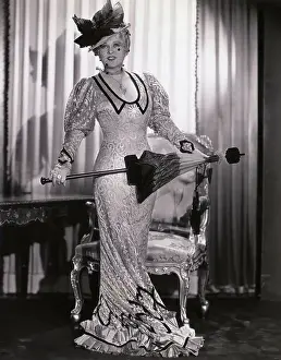 Actress Mae West Holding an Umbrella